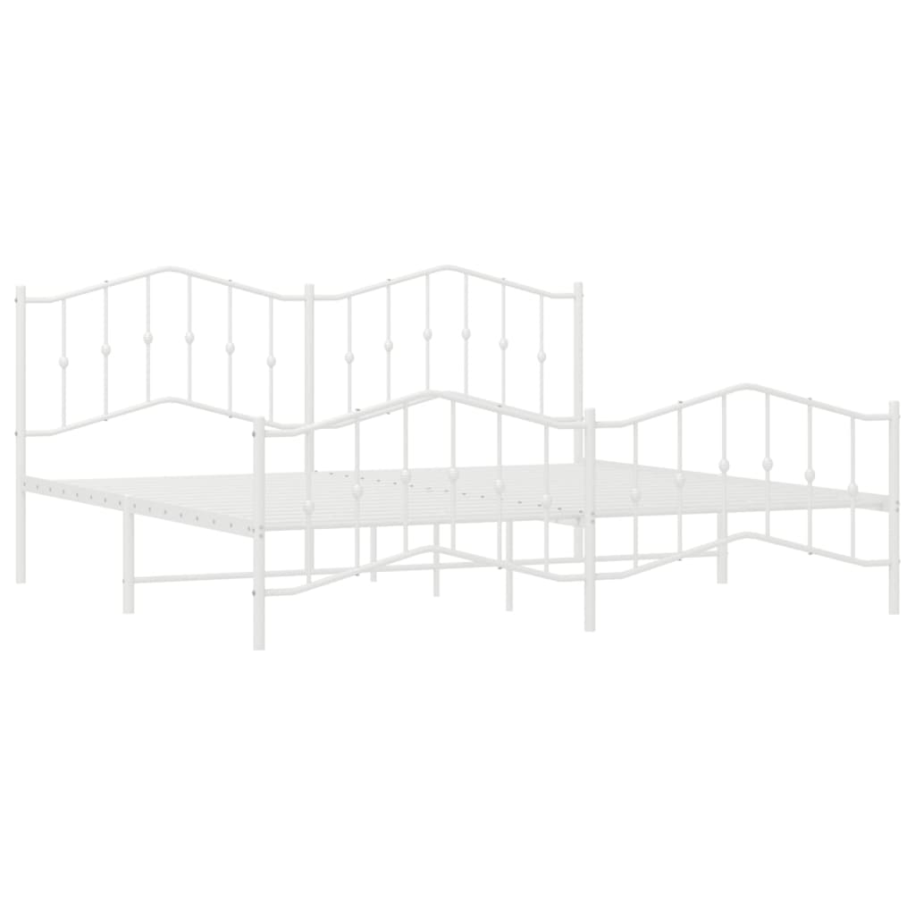 White metal kingsize bed frame with arched headboard and footboard featuring decorative finials and a slatted base for mattress support