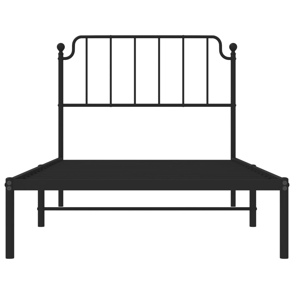 Black metal twin bed frame with a white mattress