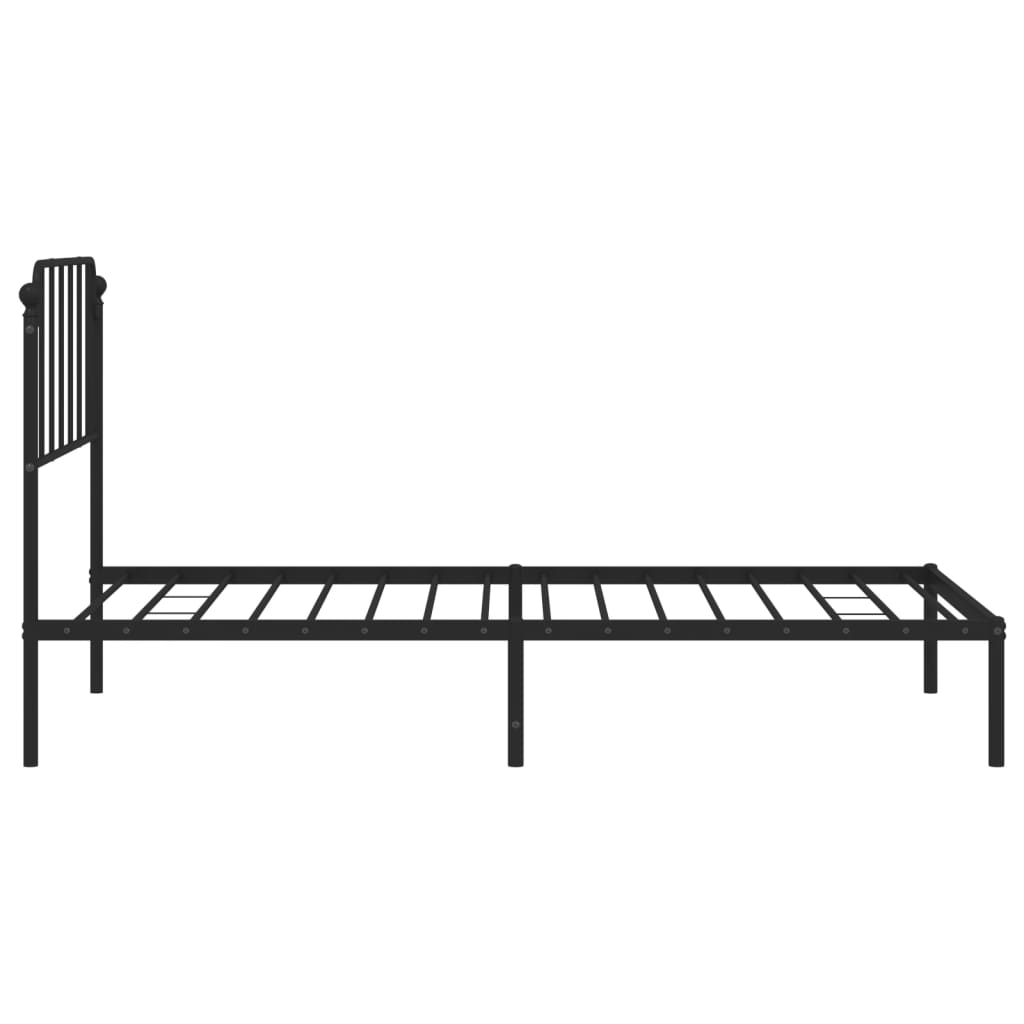 Black metal bed frame with a decorative headboard