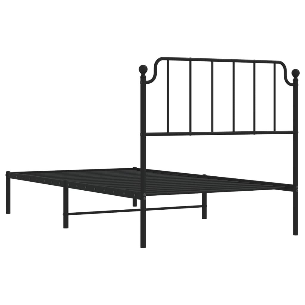Black metal bed frame with a slatted base and decorative headboard