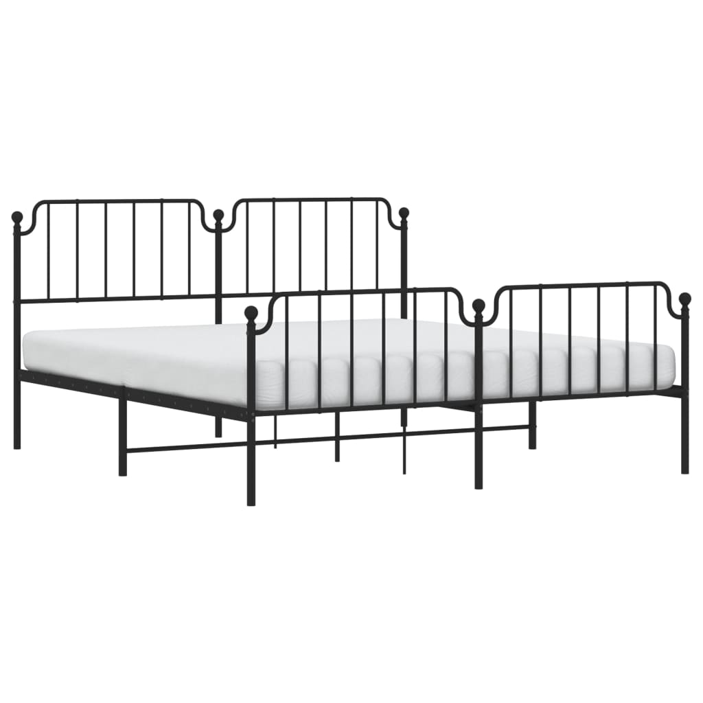 Black metal bed frame with ornate headboard and footboard