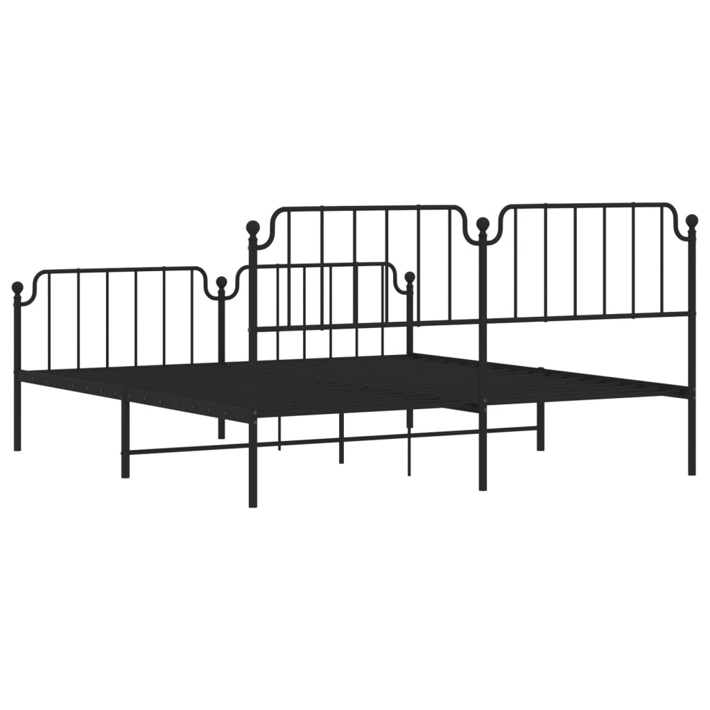 Black metal daybed with ornate headboard and footboard