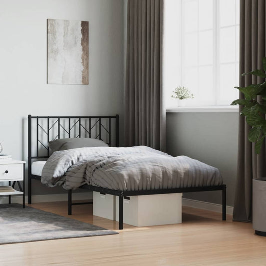 Black metal twin bed frame with geometric headboard detail