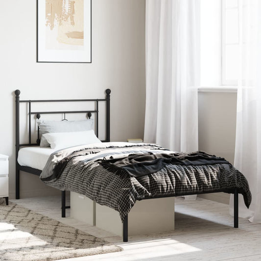 Black metal twin bed frame with ornate headboard suitable for modern bedrooms