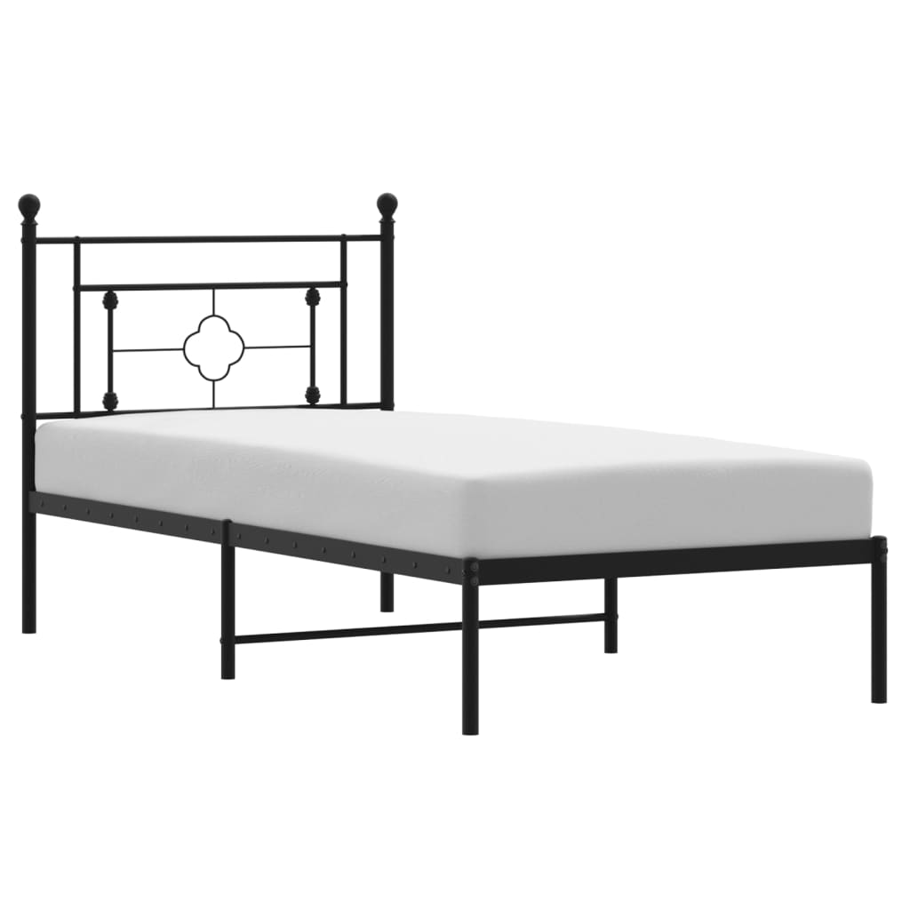 Black metal bed frame with ornate headboard and slatted base shown with dimensions