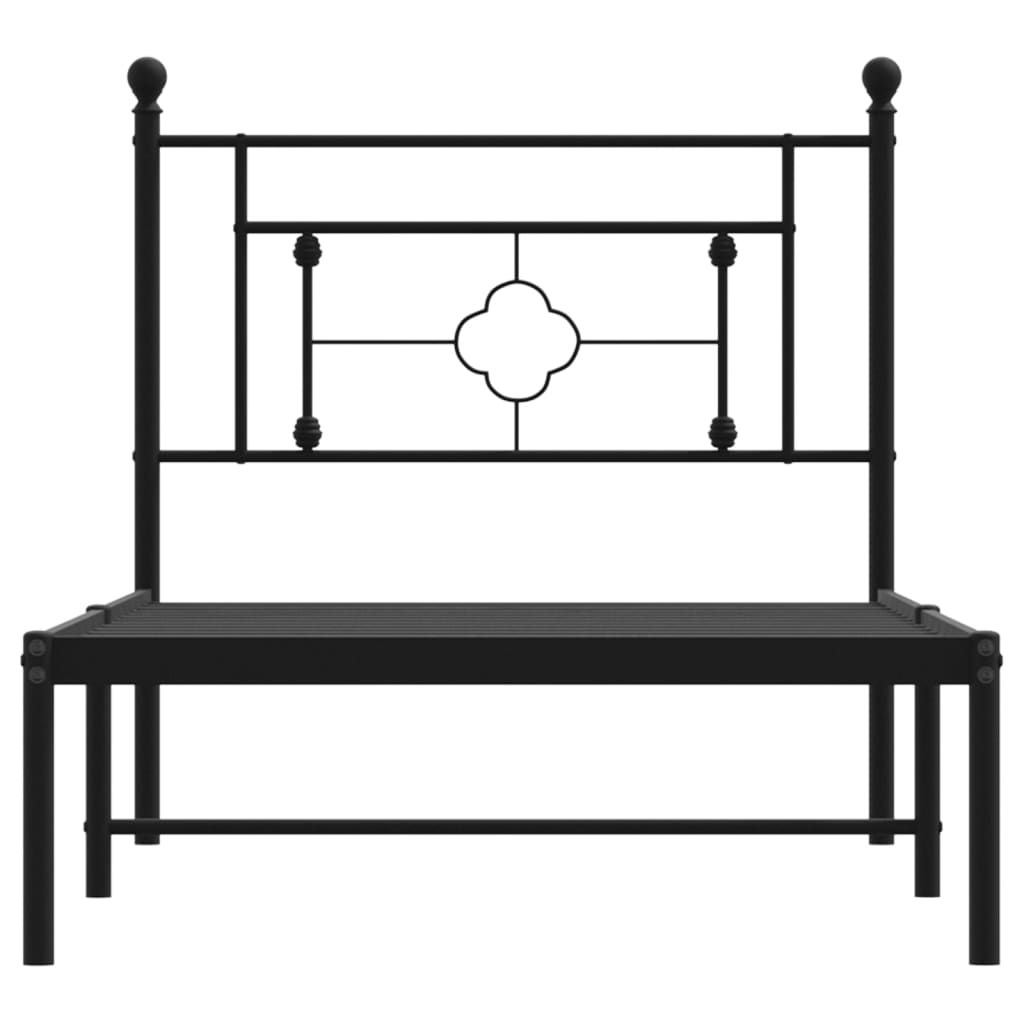 Black metal twin bed frame with decorative headboard