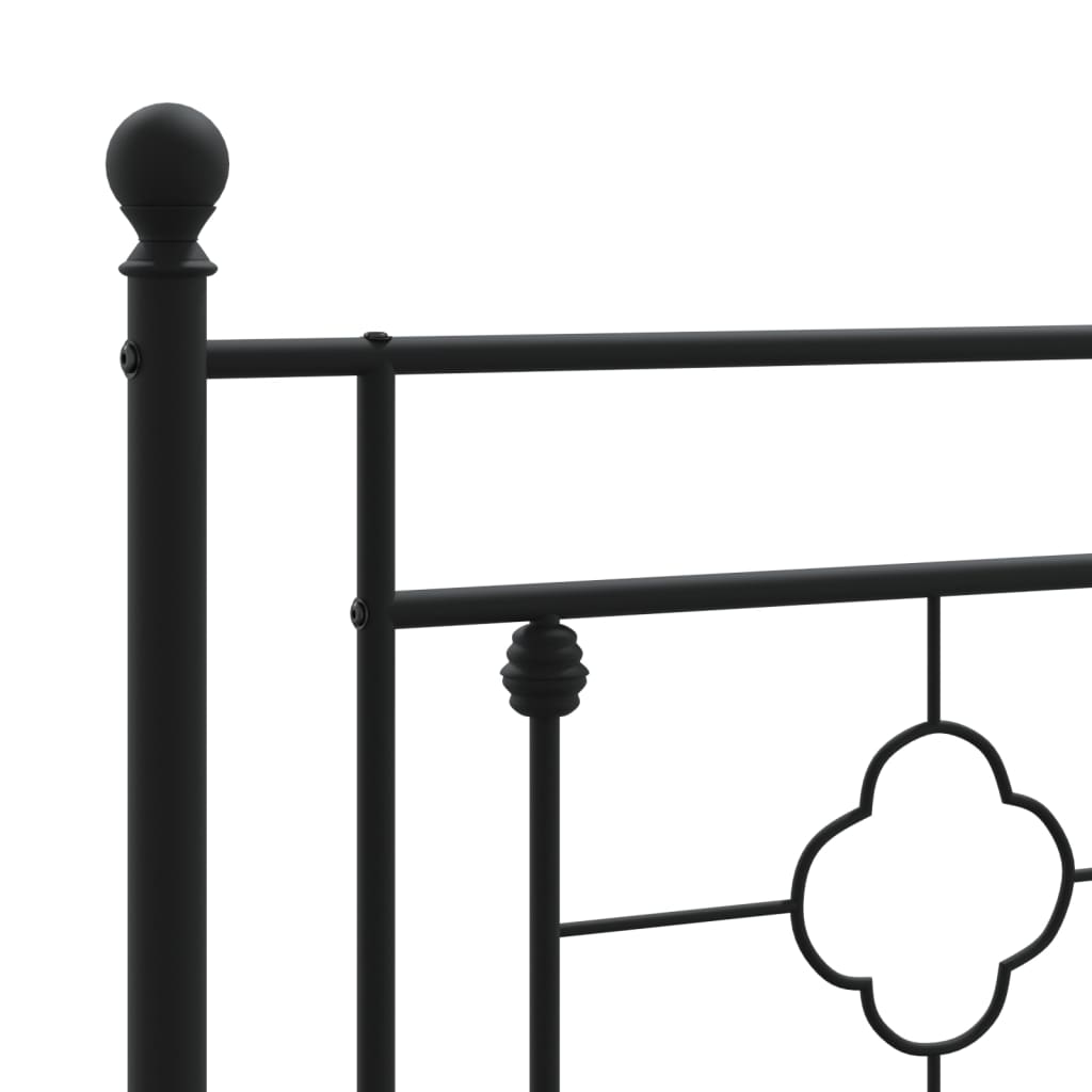 Black metal twin bed frame with ornate headboard detailing