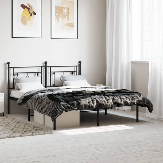 Black metal twin bed frame with decorative headboard and footboard