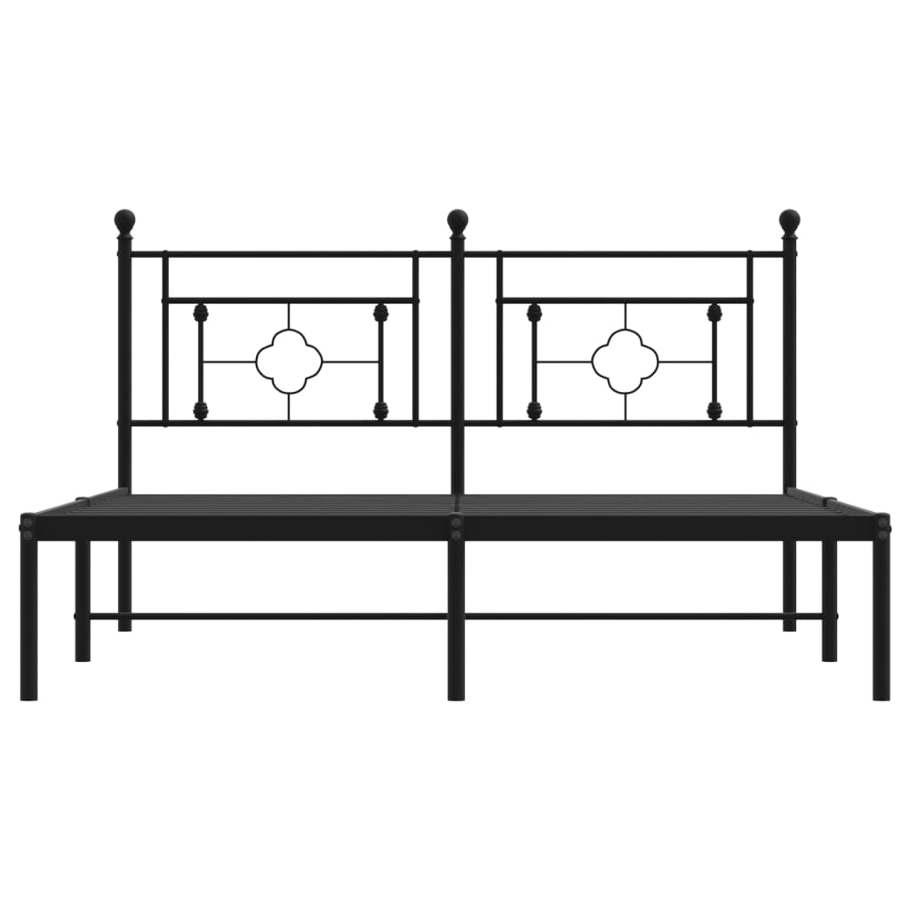 Black metal bed frame with ornate headboard detailing