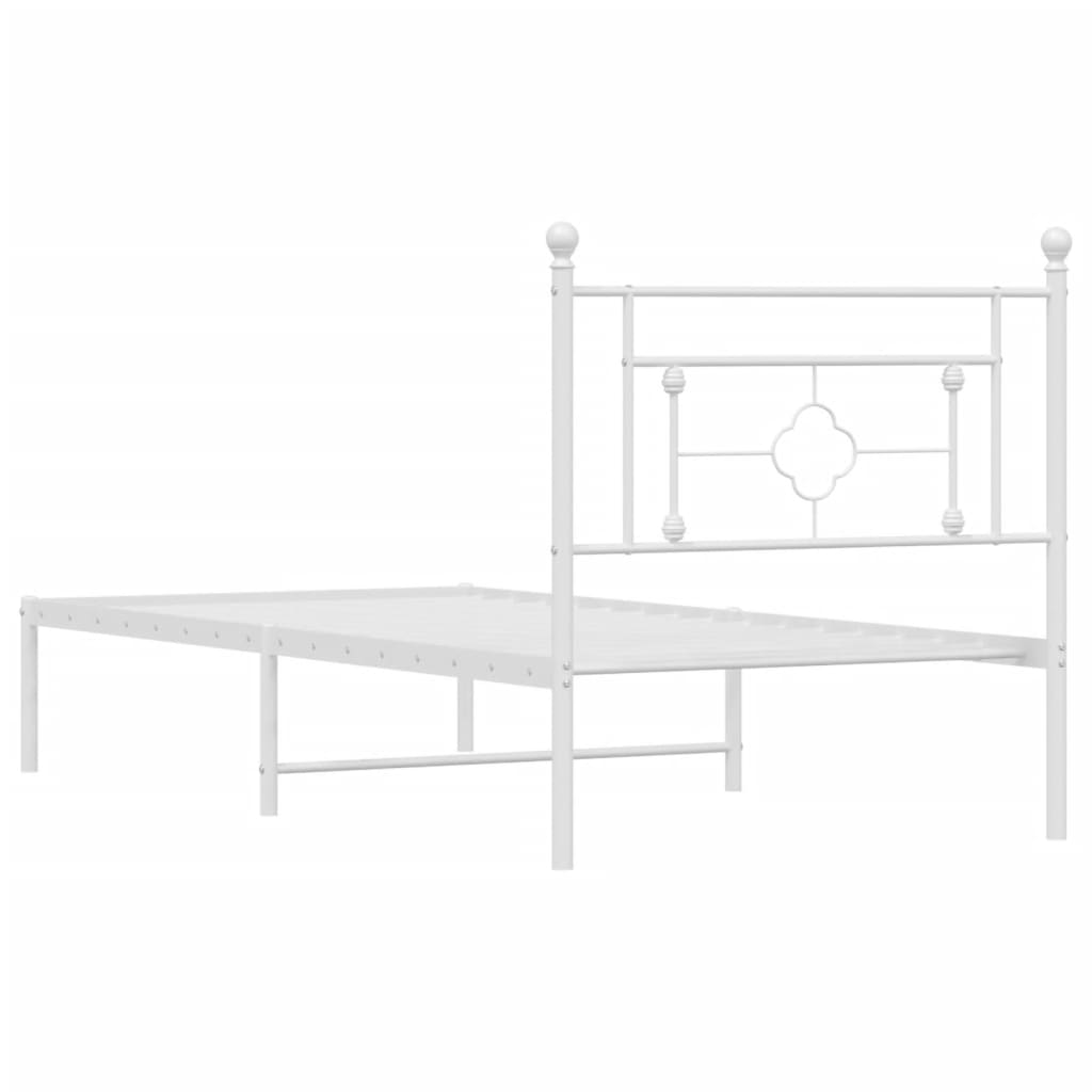 White metal twin bed frame with decorative quatrefoil headboard