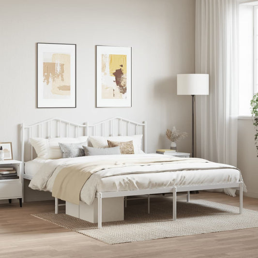 White metal bed frame with ornate headboard and footboard