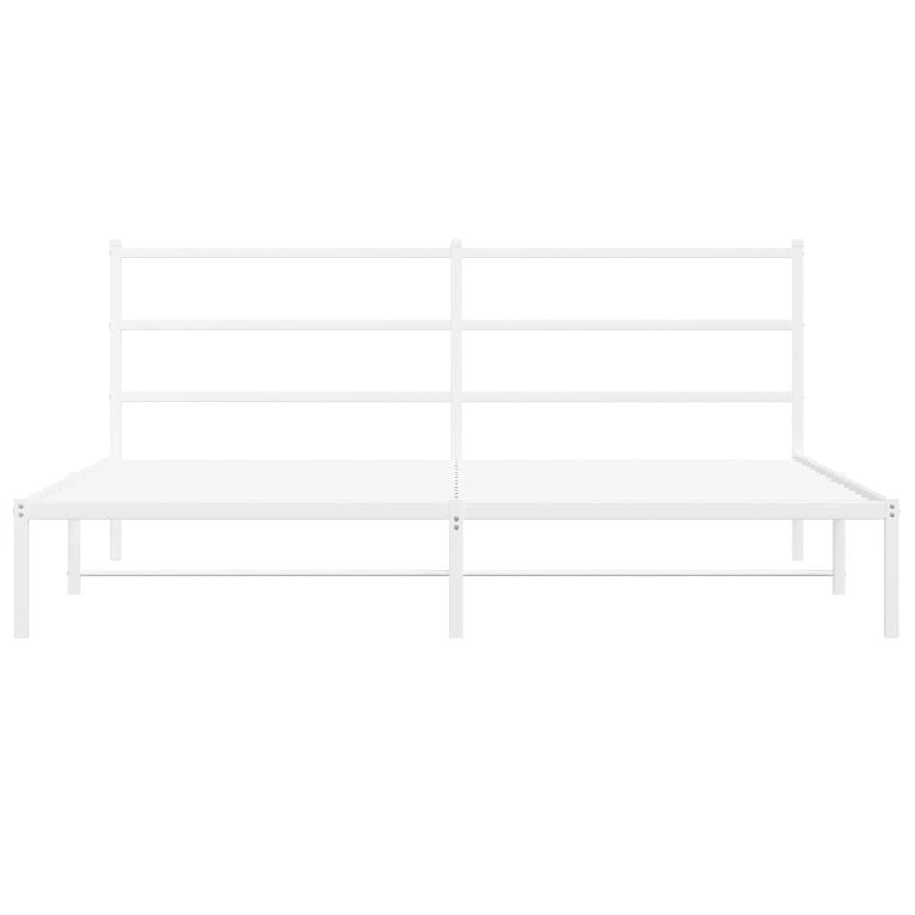 Minimalist white metal bed frame with a modern headboard and striped bedding
