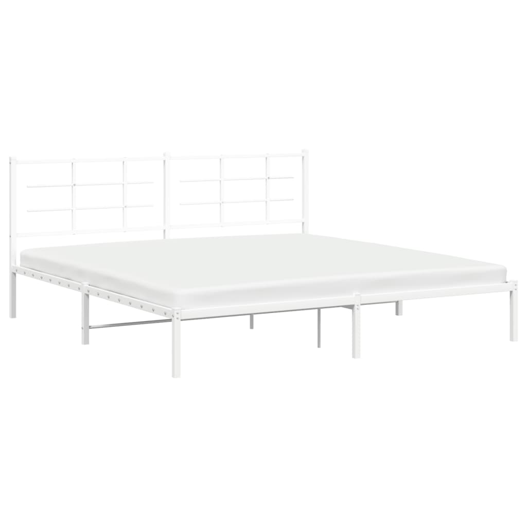 White metal platform bed frame with a modern geometric headboard
