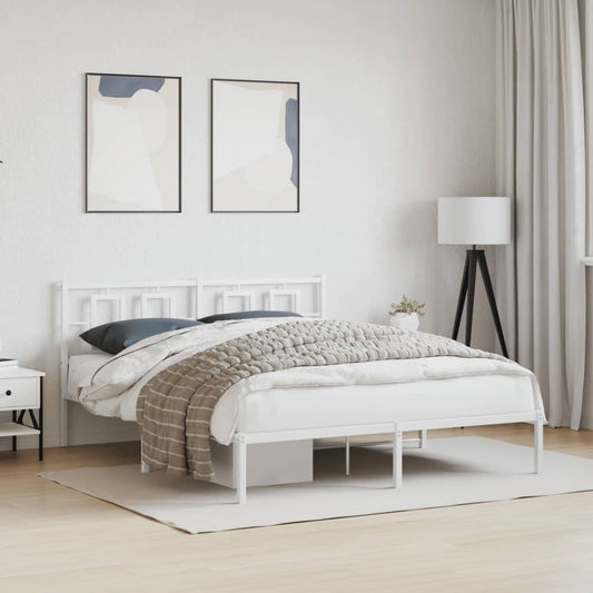 White metal queen bed frame with a modern geometric headboard and contemporary bedding