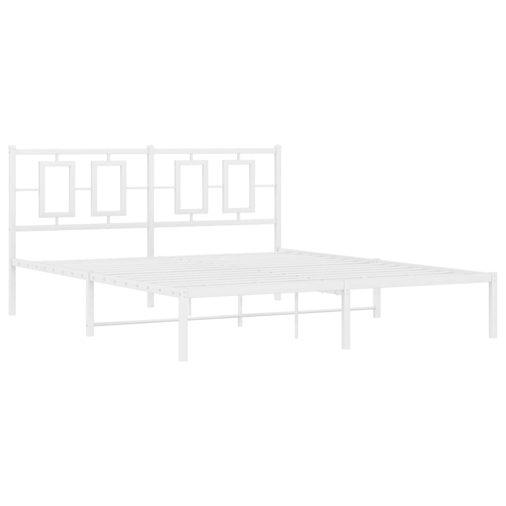 Modern white metal bed frame with geometric headboard and striped throw blanket