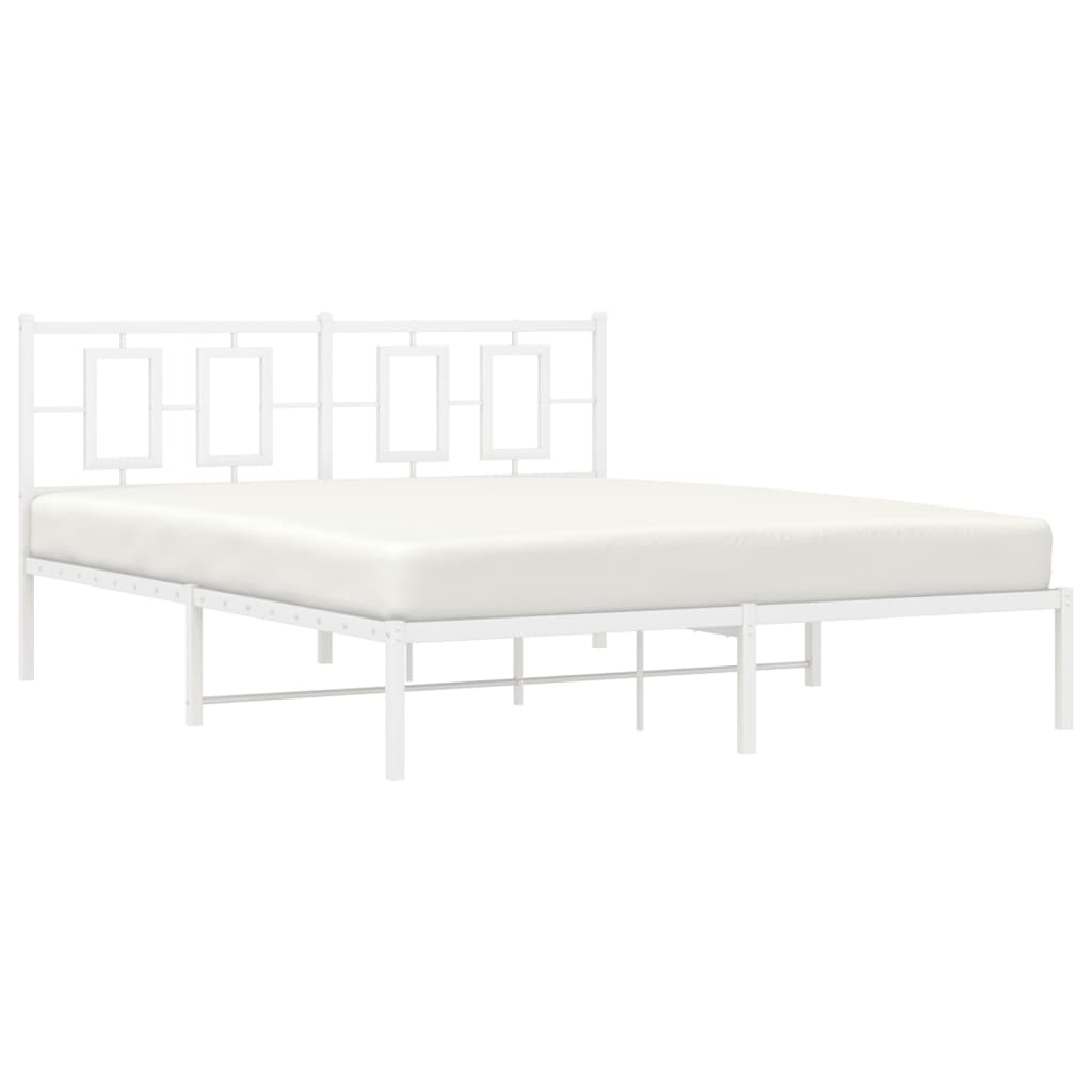 White metal platform bed frame with decorative headboard