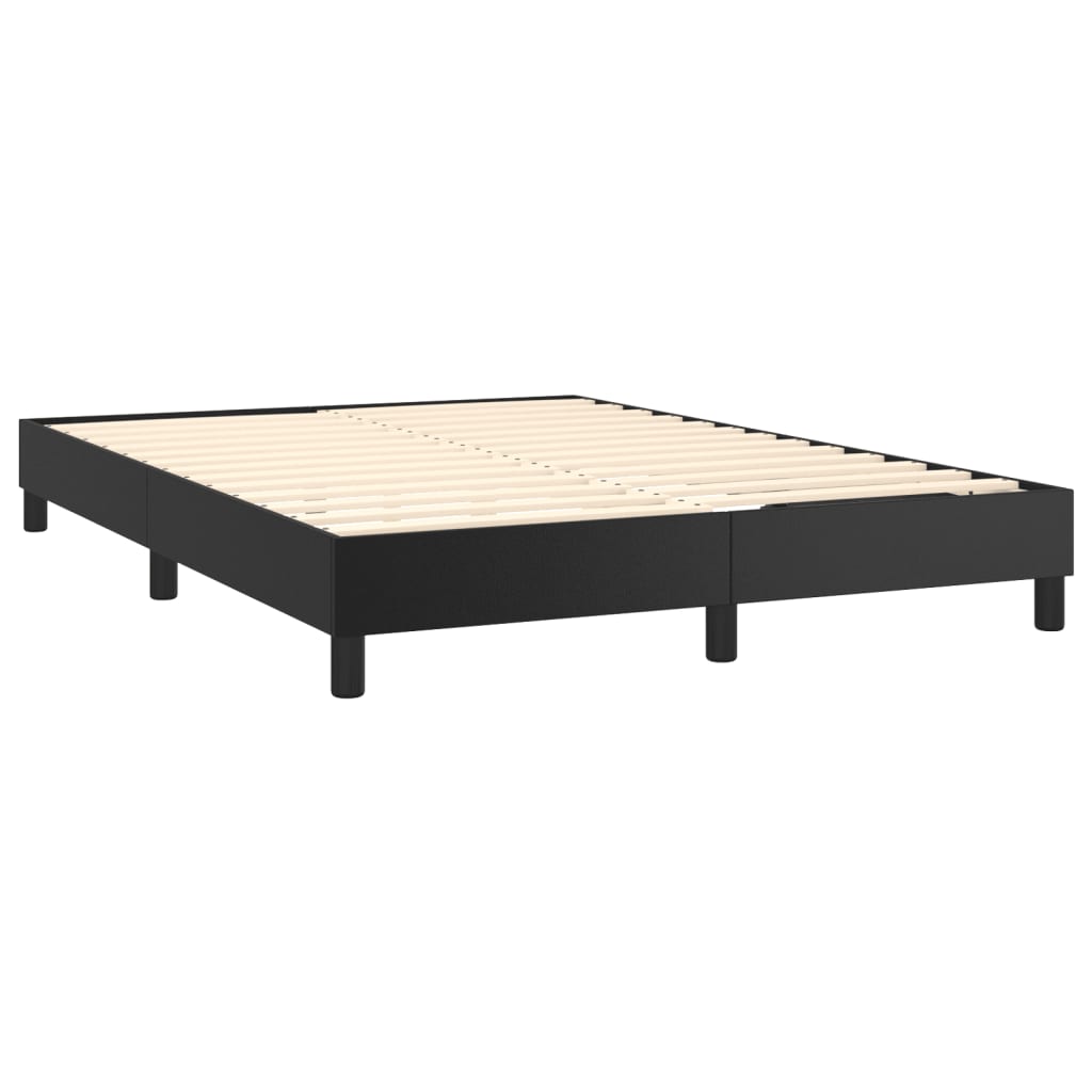 Black upholstered divan bed base with a white mattress