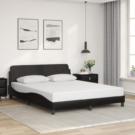 Black upholstered king size bed with white mattress and two pillows