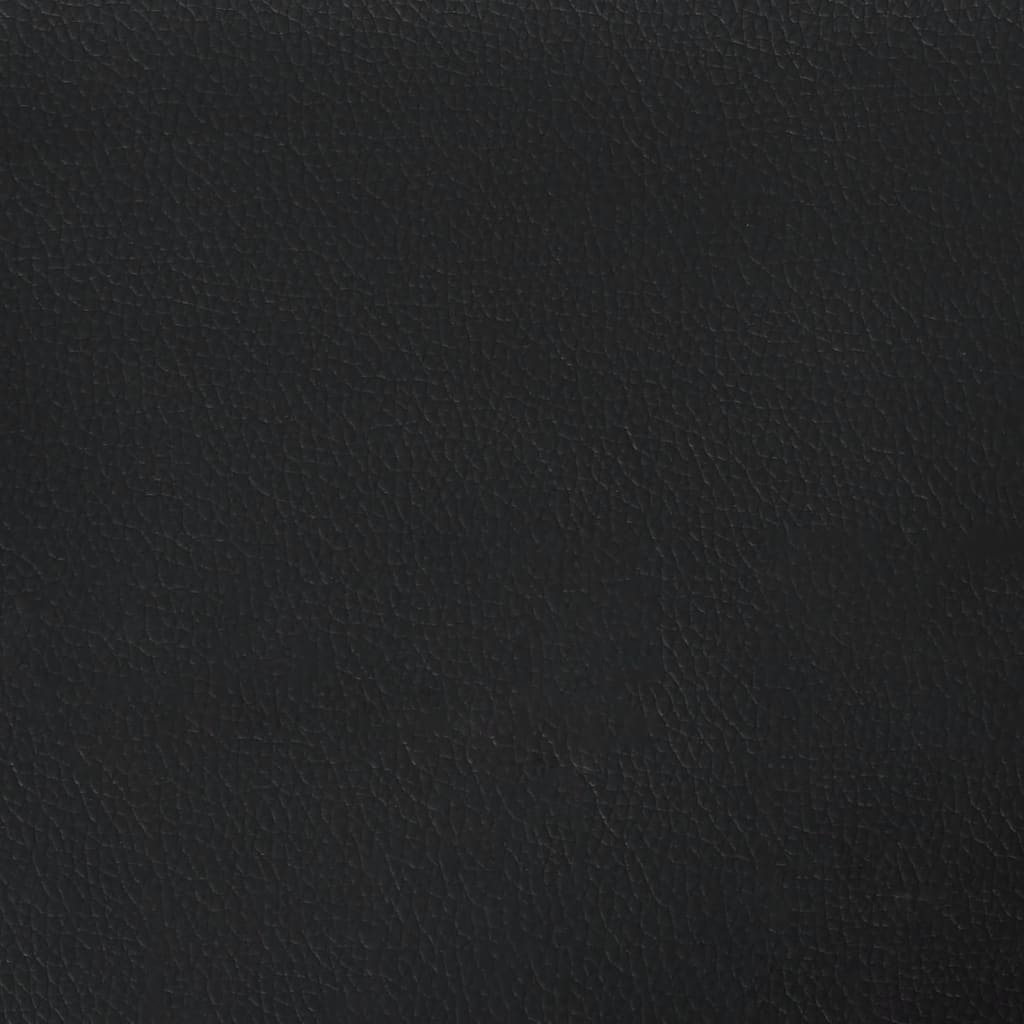 Closeup of a black upholstered bed frame corner with a dark cylindrical leg
