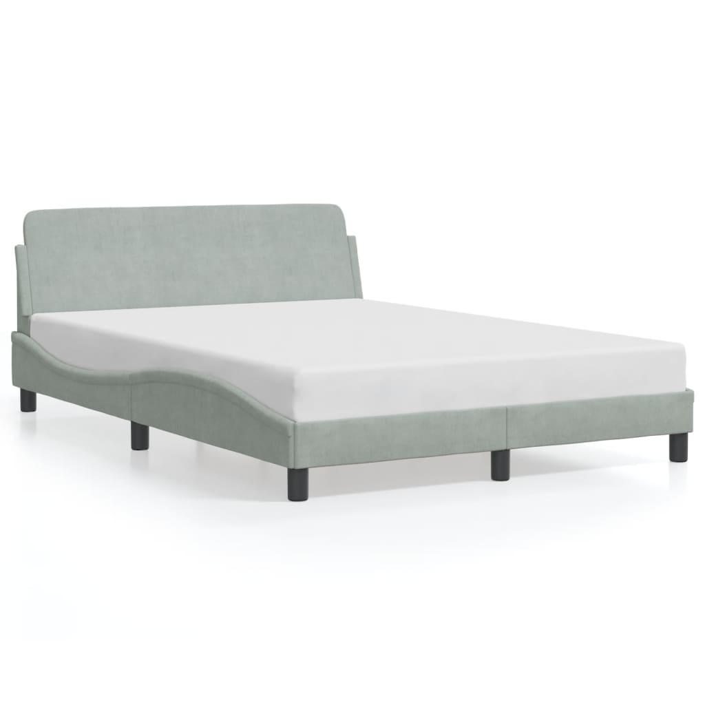 Diagram showing dimensions of a grey metal bed frame with slat support