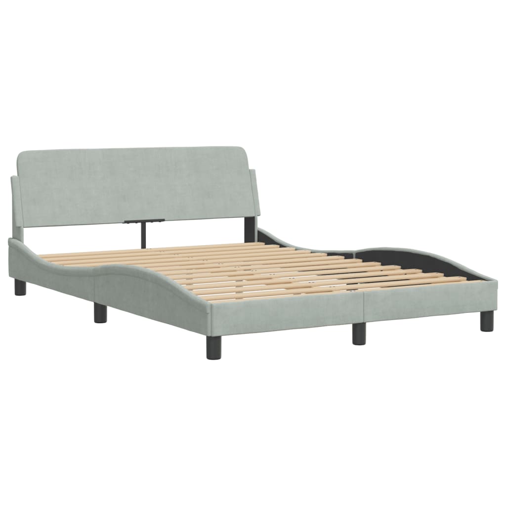 Light blue upholstered bed frame with curved headboard