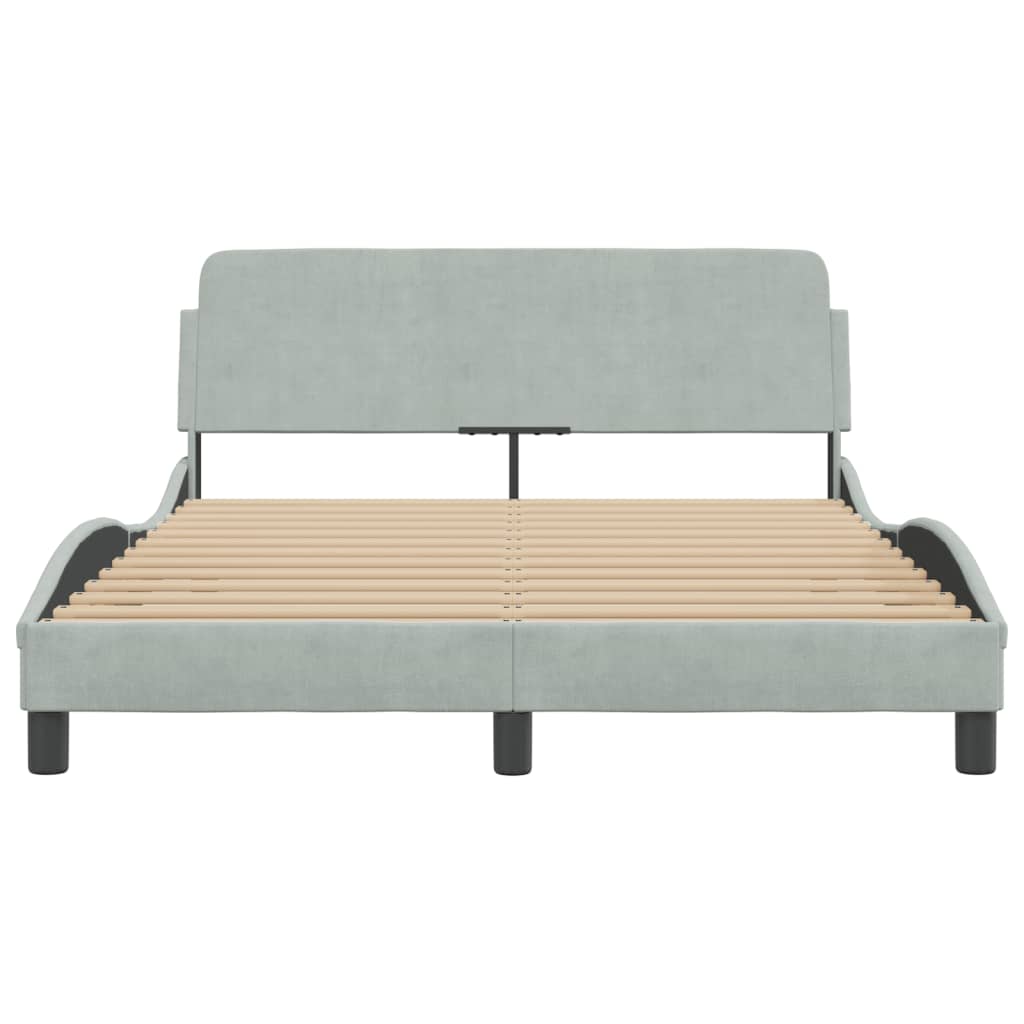 Modern light blue fabric bed frame with slatted base and curved headboard