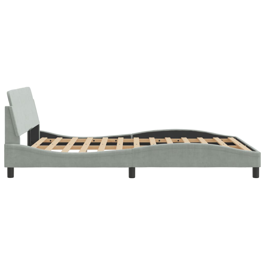 Light blue upholstered bed frame with wooden slats