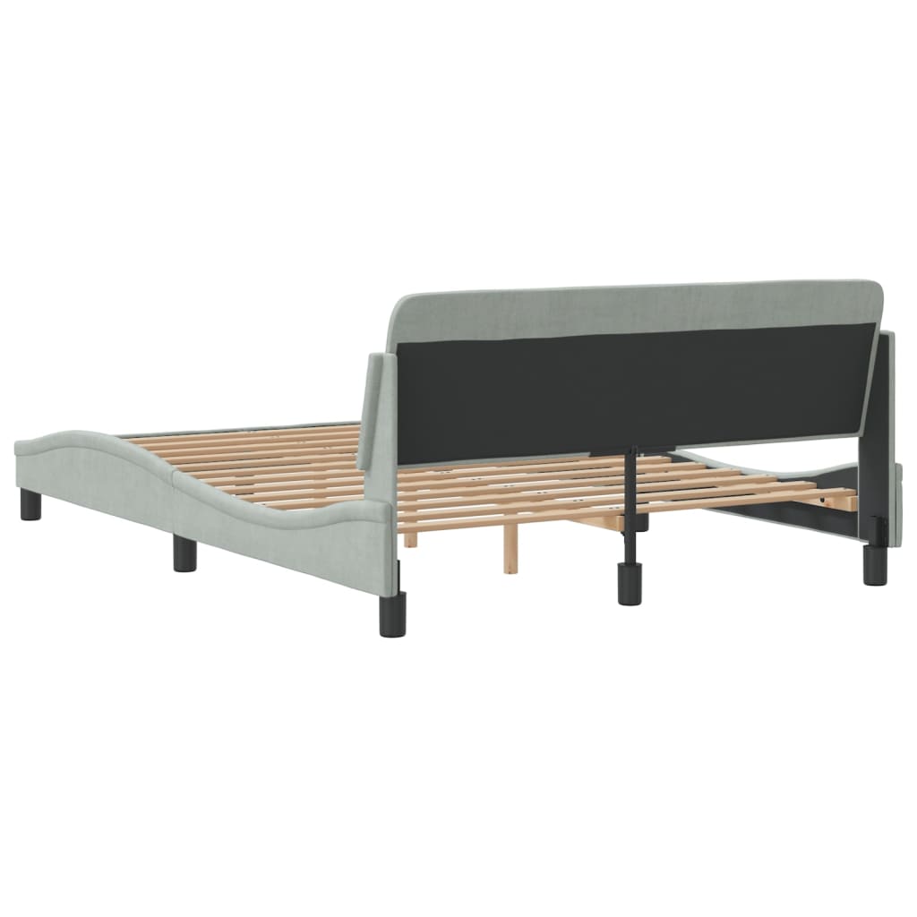 Light grey upholstered bed frame with adjustable headboard and wooden slats
