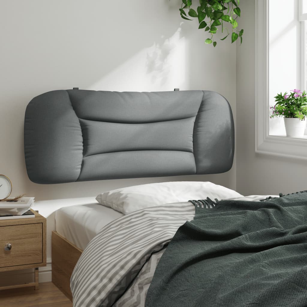 Upholstered grey fabric headboard with a curved design perfect for modern bedrooms