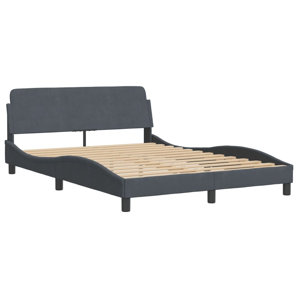 Dark grey upholstered bed frame with tufted headboard and wooden slats