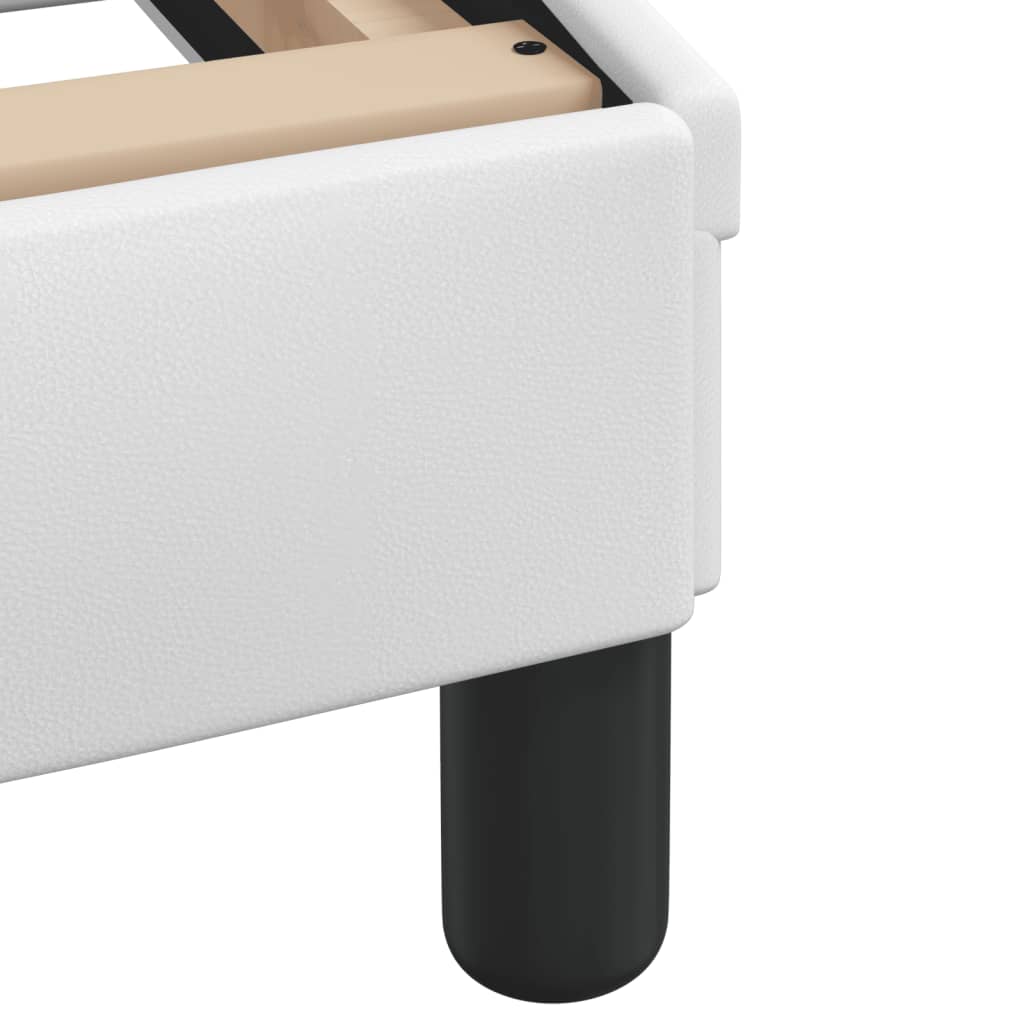 Closeup of plush white leather executive chair armrest detail