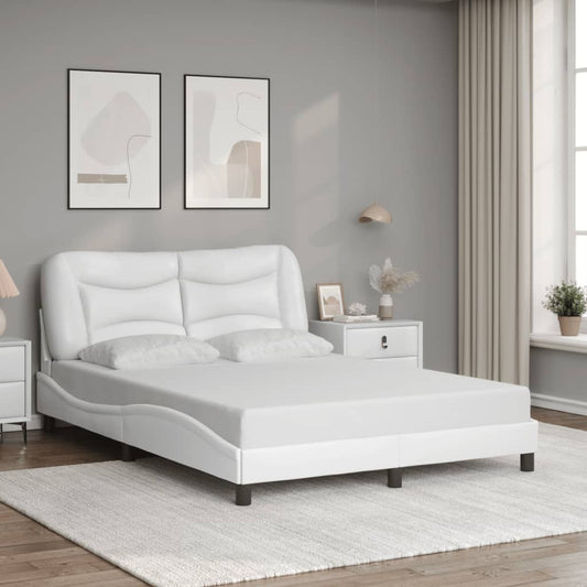 White faux leather upholstered bed frame with curved headboard and plush pillows