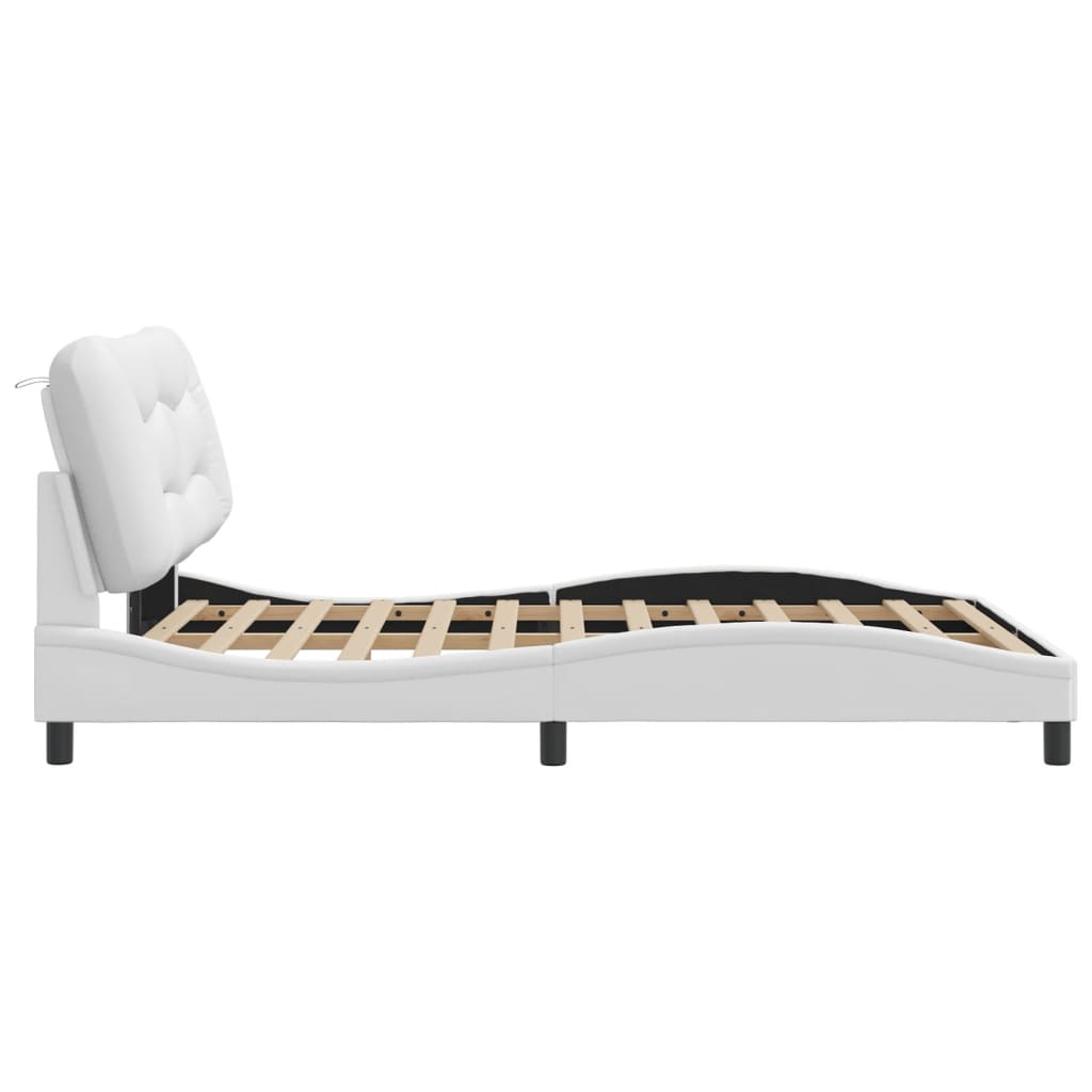 White upholstered bed frame with wooden slats and black legs