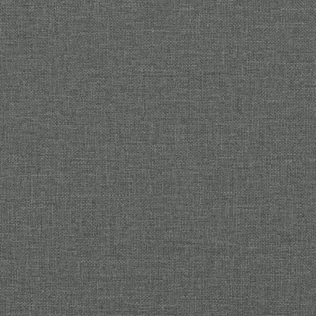 Closeup of a tufted gray fabric armchair cushion