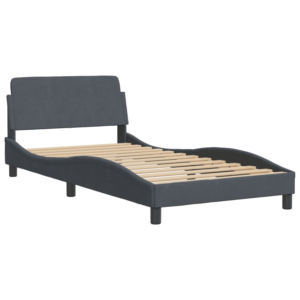 Dark gray upholstered single bed frame with curved headboard