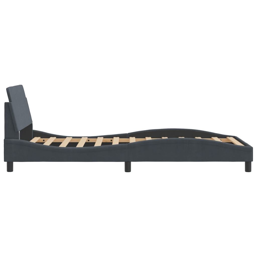 Dark gray upholstered bed frame with a curved headboard and slatted base