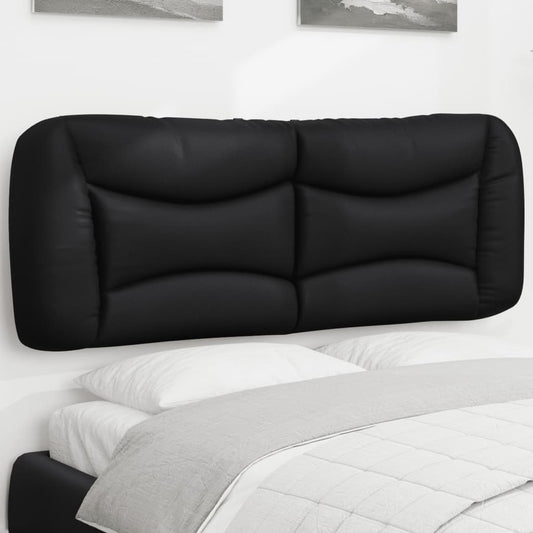 Tufted black faux leather headboard mounted above a bed