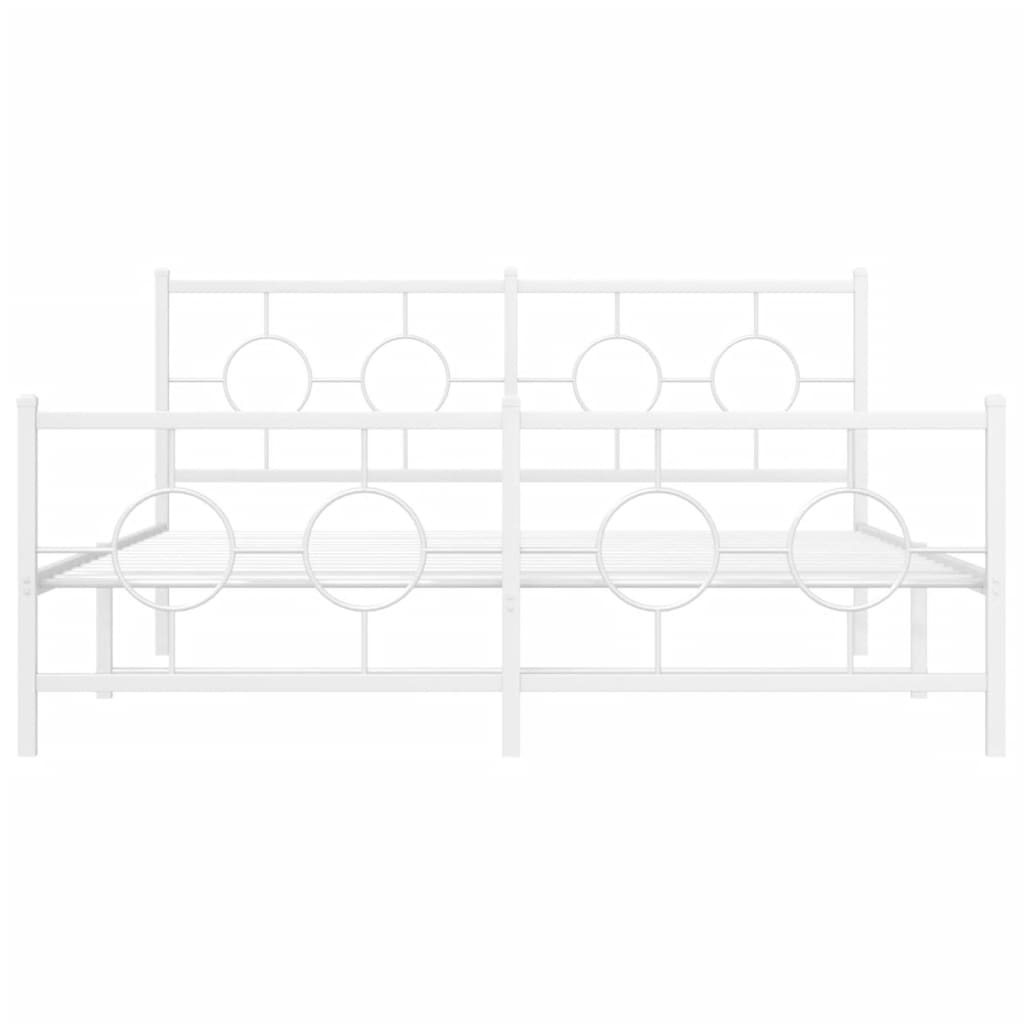 White metal bed frame with circular accents and a mattress