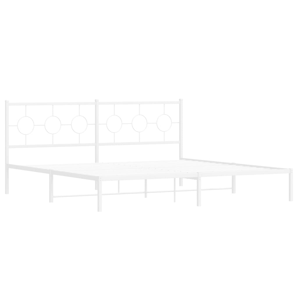 White metal bed frame with circular headboard design and bedding