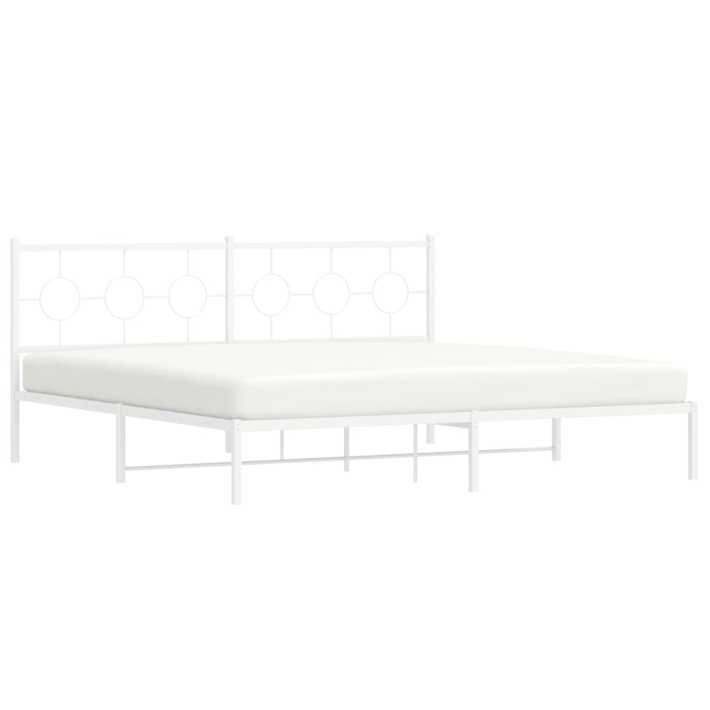 White metal bed frame with circular headboard design