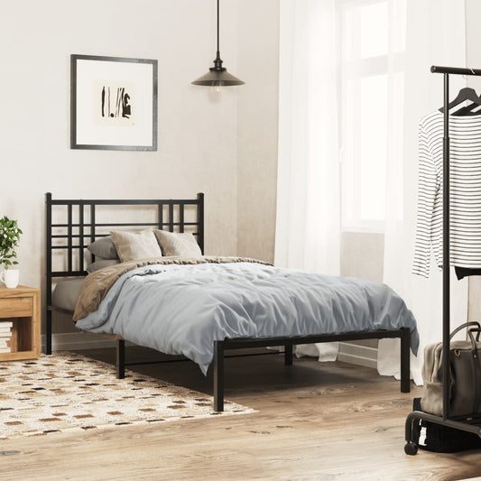 Black metal twin bed frame with a modern geometric headboard