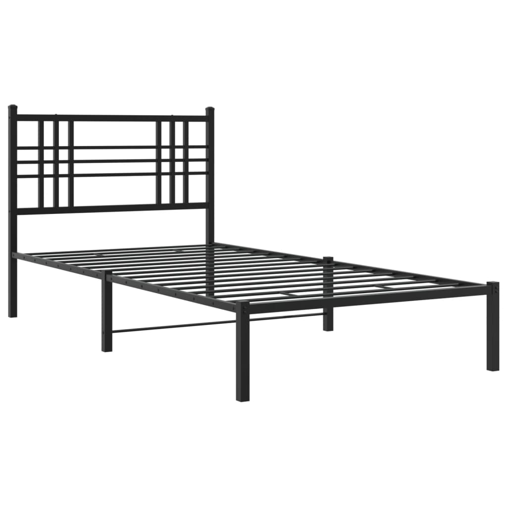 Black metal bed frame with a geometric headboard and blue bedding