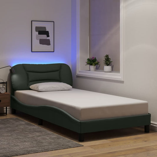 Modern dark green upholstered twin bed frame with integrated LED lighting