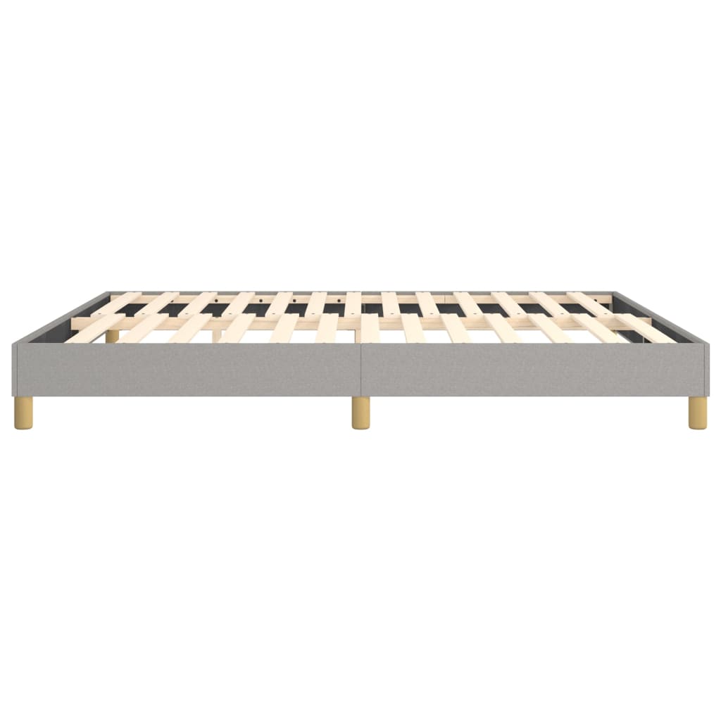 Grey upholstered queen bed frame with wooden slats and gold legs