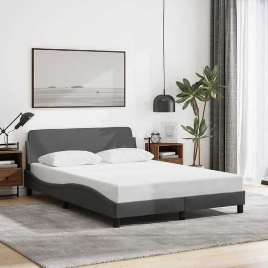 Grey upholstered platform bed frame with curved headboard and white mattress
