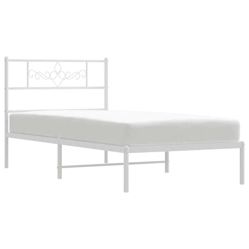 White metal bed frame with decorative headboard