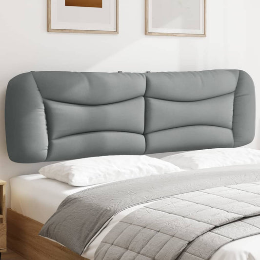 Grey upholstered curved headboard with tufted panels