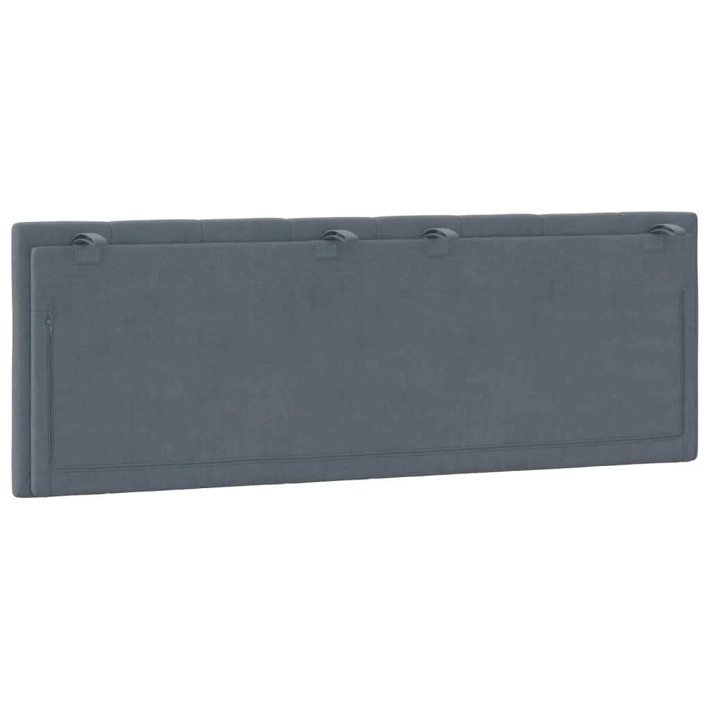 Padded grey fabric headboard with vertical channel tufting
