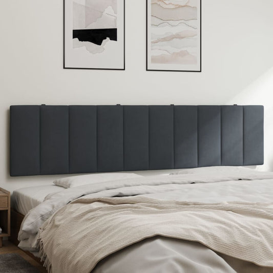 Dark gray upholstered headboard with vertical paneling