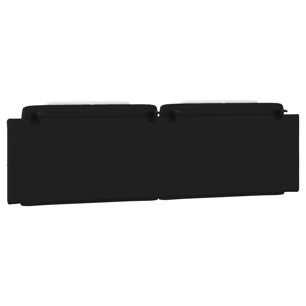 Black and white padded headboard with two white cushions